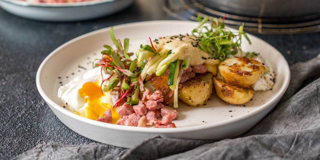 Eskort Baby Potatoes & Marrows with Crispy Bacon, Poached Eggs & Cheese Sauce