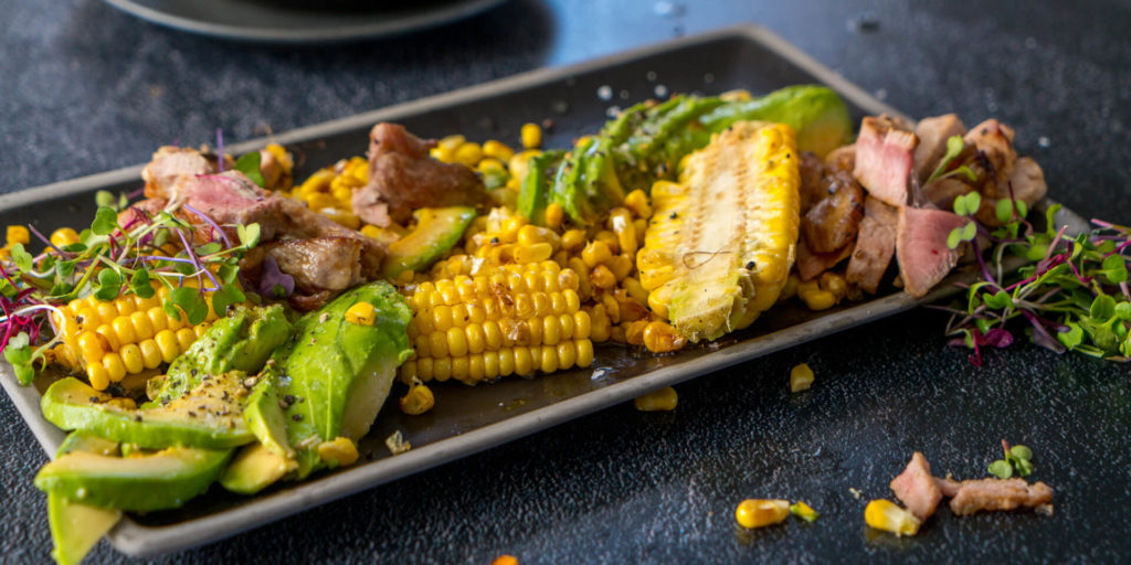 Pork Neck Steak, Charred Corn & Avocado Salad with Butter Vinegar Dressing